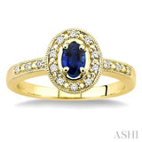 5x3 MM oval cut Sapphire and 1/10 Ctw Single Cut Diamond Ring in 14K Yellow Gold.