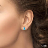 5x3 MM Oval Shape Blue Topaz and 1/8 Ctw Single Cut Diamond Halo Semi-Precious Stud Earrings in 10K White Gold