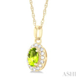 5x3 MM Oval Shape Peridot and 1/20 Ctw Single Cut Diamond Halo Semi-Precious Pendant with Chain in 14K Yellow Gold