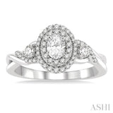 5/8 ctw Split Twisted Shank Round Cut Diamond Engagement Ring With 1/4 ct Oval Cut Center Stone in 14K White Gold