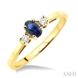 5x3 MM Oval Cut Sapphire and 1/20 ctw Round Cut Diamond Ring in 10K Yellow Gold